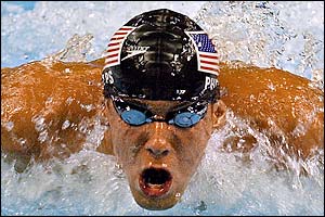 USA's Michael Phelps wins his 100m butterfly semi-final