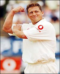 Darren Gough flexes his muscles after dismissing Boeta Dippenaar