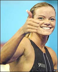 Netherlands's Inge De Bruijn celebrates after winning the women's 50m butterfly final