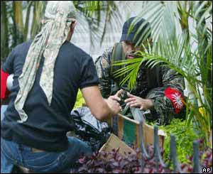 Rebels wiring up explosives