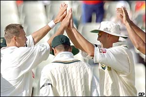 South Africa celebrate the prize wicket of Michael Vaughan