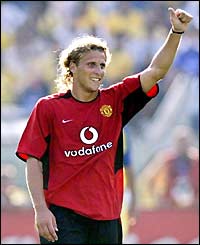 Diego Forlan celebrates after his second goal