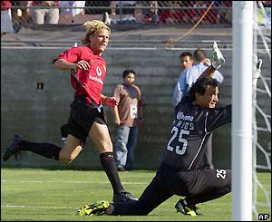 Diego Forlan hits his second goal against Club America