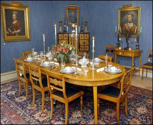 Paintings, furniture and crockery in the dining room 