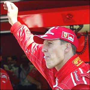 Michael Schumacher waves to the crowd at Monza after taking pole position