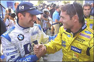 Spaniard Marc Gene of the Williams team is congratulated on his fifth place in qualifying