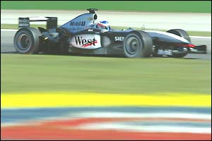 Kimi Raikkonen races to fourth place