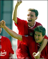 Liverpool's Vladimir Smicer congratulates Harry Kewell on his goal