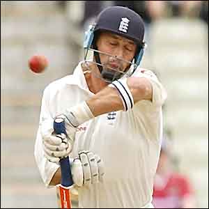 Nasser Hussain takes defensive actionat the crease