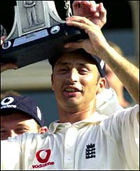 Nasser Hussain holds aloft the trophy after beating the West Indies 3-1 in the series