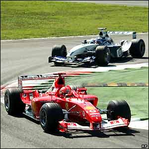 Juan Pablo Montoya follows Michael Schumacher