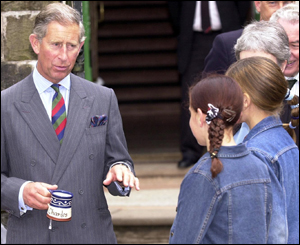 Prince Charles chats to two girls from Barry who presented him with a mug 