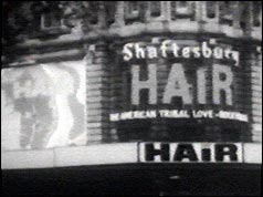 Front of theatre advertising production of Hair 
