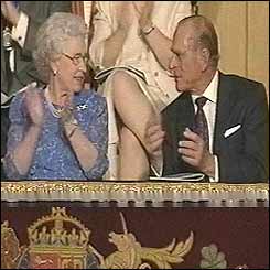 The Queen and Duke of Edinburgh applaud from the Royal Box