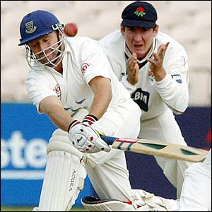 Tony Cottey plays a sweep shot