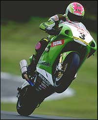 Hislop does a wheelie during the Oulton Park British Superbikes race in 1999