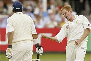 Shaun Pollock celebrates as he takes the wicket of Mark Butcher 