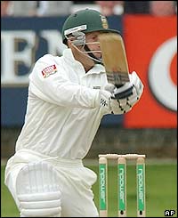 Gary Kirsten hits the ball for four 