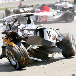 The aftermath of Raikkonen's horrific crash