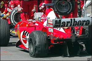 Schumacher gets a flat tyre just four laps from the end