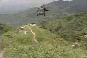 Helicopter searching the mountains