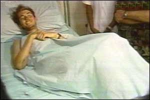 Matthew in a hospital bed