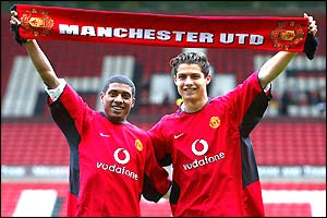 World Cup winner Kleberson and young Portuguese prodigy Cristiano Ronaldo pose at Old Trafford