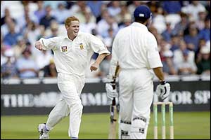 Shaun Pollock celebrates the dismissal of Michael Vaughan
