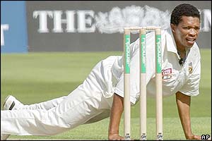 Makhaya Ntini reacts after failing to stop a four 