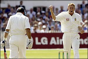 Shaun Pollock celebrates as he removes Nasser Hussain lbw for 116