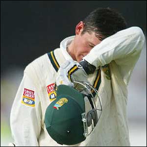 Graeme Smith leaves the field after he has been bowled by Flintoff