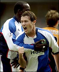 Blackburn's Brett Emerton celebrates scoring