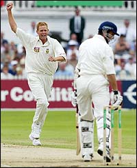 Shaun Pollock celebrates taking the wicket of Michael Vaughan who is caught by keeper Mark Boucher