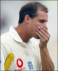 Ed Smith returns to the pavilion after being trapped lbw by his first delivery