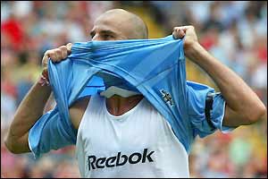 Antione Sibierski celebrates scoring Man City's second