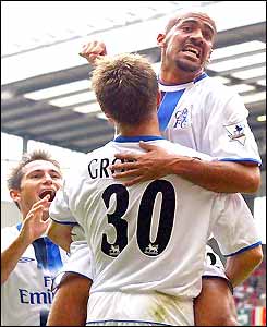 Juan Sebastian Veron celebrates his goal with Jesper Gronkjaer and Frank Lampard