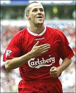 Michael owen runs to the Kop after scoring a penalty