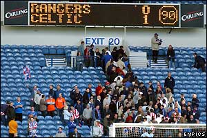 Rangers fans leave in their droves