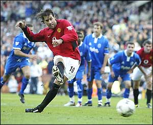 Ruud van Nistelrooy scores a penalty