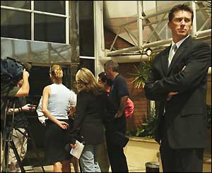 Glenn McGrath is ignored by the media, who are interviewing physio Errol Allcott