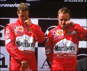 Michael Schumacher and Rubens Barrichello are booed on the podium in Austria in 2002