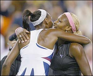 Venus Williams hugs Serena at the end of the match