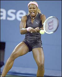 Serena Williams hits a forehand