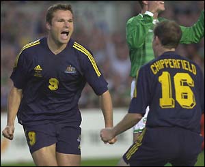 Mark Viduka celebrates his goal with team-mate Scott Chipperfield