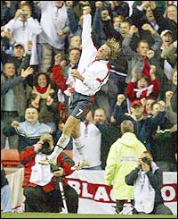 David Beckham punches the air with delight as he scores against Turkey at the Stadium of Light, Sunderland