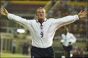 Wayne Rooney shows his glee at scoring his first international goal in Macedonia