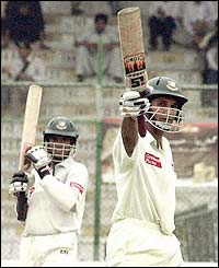 Bangladesh's Habibul Bashar salutes his half century