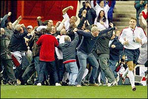 England fans invade the pitch to celebrate England second goal against Turkey