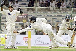 Bangladesh's Khaled Mashud edges the ball just past the Pakistan slip cordon