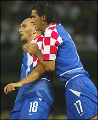 Croatia's Ivica Mornar is congratulated after scoring his side's only goal
